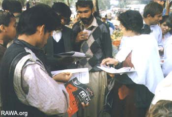 RAWA members sell their publications in Sunday Bazzar in Islamabad